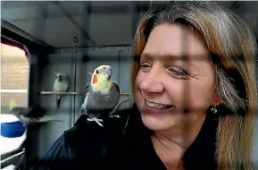  ?? PHOTO: MARTIN DE RUYTER/ FAIRFAX NZ ?? Donna Walzl with one of the resident cockatiels.