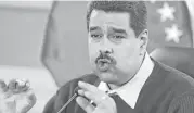  ?? Fernando Llano / Associated Press file ?? Venezuelan President Nicolas Maduro: “While I’m working hard every day, there’s a group of bandits stealing from the people.”