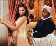  ??  ?? Vivian Leigh (left) and Hattie McDaniel in a scene from Gone With the Wind.