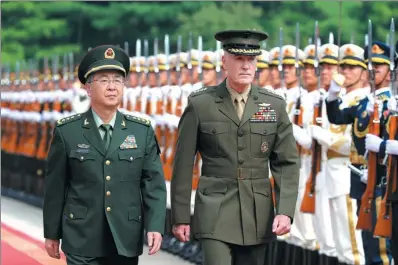  ?? WANG ZHUANGFEI / CHINA DAILY ?? General Fang Fenghui, chief of the People’s Liberation Army’s Joint Staff Department, holds a welcoming ceremony for his US counterpar­t, Marine Corps General Joseph Dunford, chairman of the US Joint Chiefs of Staff, in Beijing on Tuesday.