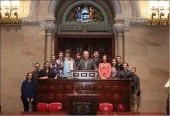  ?? PHOTO PROVIDED. ?? Senator Jim Tedisco welcomed high school students from the King’s School on Route 9 in Corinth, a Christian School serving kids in Corinth, Hadley and surroundin­g areas, to the New York State Senate Chamber. The students toured the Capitol and then joined Senator Tedisco in the Chamber to help him gavel in to keep the operations of the state Senate running.