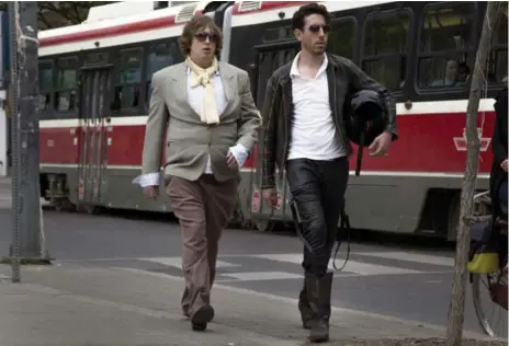  ??  ?? Matt Johnson, left, and Jay McCarrol play aspiring musicians in the “semi-scripted” which films throughout Toronto.