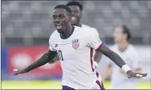  ?? FERNANDO LLANO — THE ASSOCIATED PRESS ?? Tim Weah celebrates his goal in the 11th minute Tuesday that gave the U.S. a 1-0 lead over Jamaica. The match ended in a 1-1 draw.