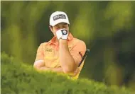  ?? ERIC GAY AP ?? Viktor Hovland reacts after failing to get his ball out of the bunker on the 16th hole during Sunday’s final round.