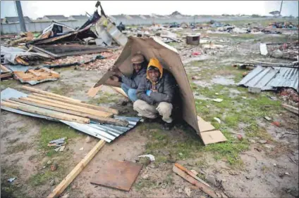  ??  ?? Where to? The goverment said it had aimed to become a developmen­tal state by 2005, but transforma­tive social policy had failed when the same government evicted shack dwellers on Sanral land in the winter of 2014.Photo: David Harrison
