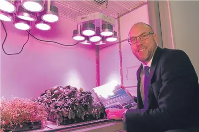  ??  ?? Under the spotlight: Bid leader David Littlejohn with the Tay Cities Deal document ahead of its submission for government scrutiny earlier this year. The outcome of the bid is not yet known.