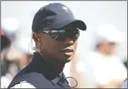  ?? AP/JULIO CORTEZ, FILE ?? Tiger Woods looks on before the first round of the Presidents Cup golf tournament on Sept. 28, 2017, at Liberty National Golf Club in Jersey City, N.J. The last time Tiger Woods was at Liberty National, he hadn’t played in eight months and couldn’t guarantee he would play again. So much has changed in two years as the FedEx Cup playoffs begin.