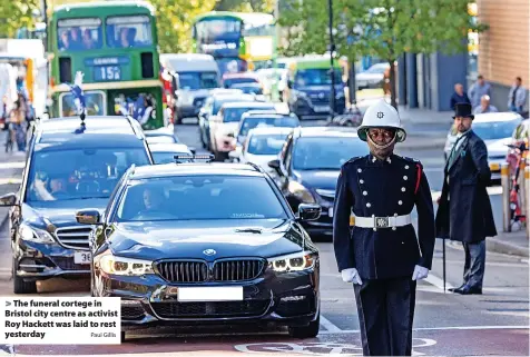  ?? Paul Gillis ?? The funeral cortege in Bristol city centre as activist Roy Hackett was laid to rest yesterday