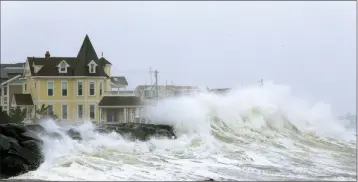  ?? ASSOCIATED PRESS ?? HEAVY OCEAN SURF crashes over the seawall between 7th and 8th Streets in Avalon, N.J., Wednesday. A study released last week suggests global warming is likely slowing the main Atlantic Ocean circulatio­n, which has plunged to its weakest level on record.
