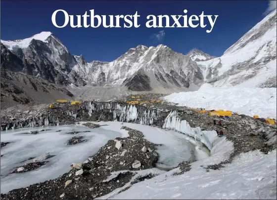  ?? (File Photo/AP/Tashi Sherpa) ?? Tents are set up for climbers April 11, 2015, on the Khumbu Glacier, with Mount Khumbutse (center) and Khumbu Icefall (right) seen in the background, at Everest Base Camp in Nepal.