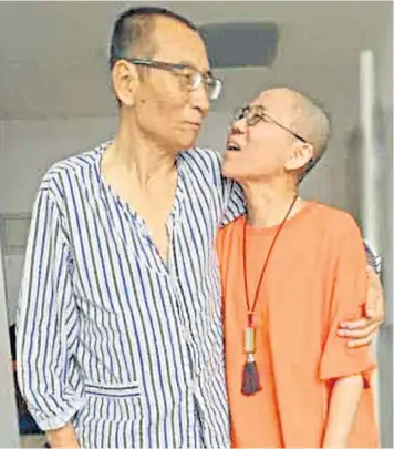  ??  ?? An undated photo made available on the Twitter account of Guangzhou-based activist Ye Du shows Liu Xiaobo with his wife Liu Xia