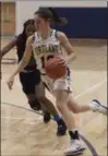  ?? JEN FORBUS — FOR THE MORNING JOURNAL ?? Kirtland’s Jenna Sayle drives to the basket against Lutheran East on Feb. 27.