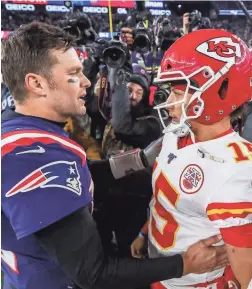  ?? PAUL RUTHERFORD/USA TODAY SPORTS ?? Former Patriots quarterbac­k Tom Brady (12) and Chiefs quarterbac­k Patrick Mahomes (15) after a game at Gillette Stadium.