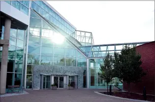  ?? NEWS FILE PHOTO ?? The sun glints though the windows at Medicine Hat city hall. Council unanimousl­y approved Monday a financial plan to close shallow gas wells that includes borrowing $80 million.