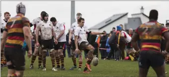  ??  ?? Outhalf Mark Butler Kicks for Sligo.