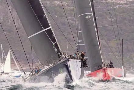  ?? REUTERS PIC ?? Black Jack (left) and LDV Comanche compete at the start of the Sydney to Hobart Race yesterday.