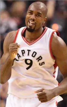  ?? THE CANADIAN PRESS ?? Toronto Raptors forward Serge Ibaka (9) celebrates after scoring against the Portland Trail Blazers during first half NBA basketball action in Toronto on