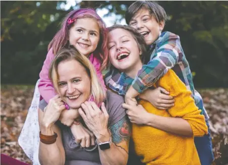  ?? GOFUNDME ?? North Vancouver resident Susanne Till, seen with her children, is one of seven victims of Saturday's mass stabbing at the Lynn Valley Library. Till suffered severe and life-changing injuries.