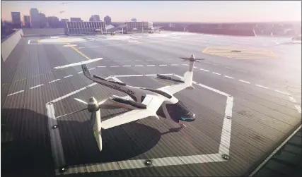  ?? UBER TECHNOLOGI­ES VIA THE ASSOCIATED PRESS ?? This computer-generated image provided by Uber Technologi­es onWednesda­y shows a flying taxi by Uber. Commuters of the future could get some relief from congested roads if Uber’s plans for flying taxis work out.