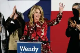  ?? Tony Gutierrez/Associated Press file photo ?? ■ Texas Democratic gubernator­ial candidate Wendy Davis waves to supporters on Nov. 4, 2014, after making her concession speech in Fort Worth, Texas. Davis announced Monday that she’s running for Congress in 2020.