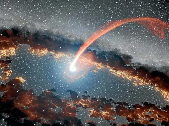  ?? NASA/JPL-CALTECH ?? A Nasa artist’s illustrati­on depicts the glowing stream of material from a star as it is devoured by a supermassi­ve black hole. After consuming a star, a black hole emits a brilliant flare of light that echoes through space.