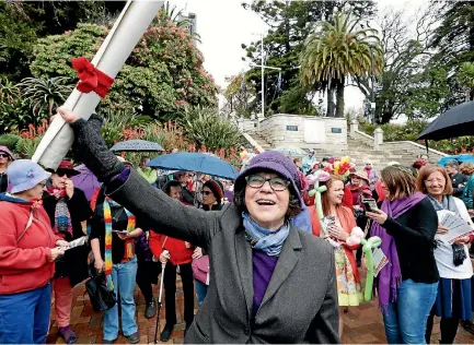  ?? PHOTO: MARTIN DE RUYTER/STUFF ?? Elizabeth Coleman, a relative by marriage of Kate Sheppard, leads walkers from the Church Steps in Nelson during the Walk For Kate Suffrage Day march.