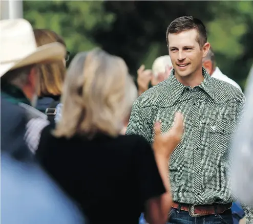  ?? LEAH HENNEL / POSTMEDIA NEWS ?? Edouard Maurice was all smiles outside provincial court in Okotoks, Alta., in June when charges were dropped.