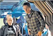  ??  ?? ‘Profoundly sad’: Stewart with director Bryan Singer, on the set of X-men: Days of Future Past