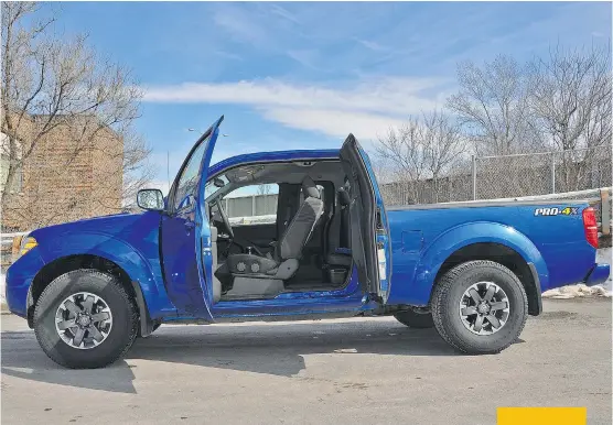  ?? PHOTOS: DEREK MCNAUGHTON/ DRIVING ?? The 2015 Nissan Frontier Pro- 4X is a king cab with clam shell doors.