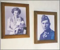  ??  ?? Framed photograph­s of Chapman (right) and his late wife, Katherine Robinette, are seen on the wall in his house.