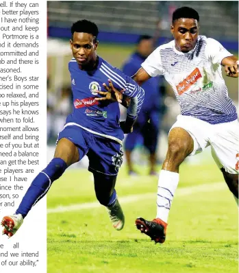  ?? FILE ?? Cardel Benbow (left) of Mount Pleasant and Emelio Rousseau of Portmore United in a tussle in a Red Stripe Premier League semi-final at the National Stadium in Kingston on April 15, 2019.