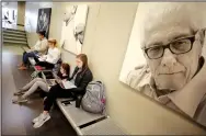  ?? NWA Democrat-Gazette/DAVID GOTTSCHALK ?? Catherine Beachner (right), a sophomore at the University of Arkansas, and student in the Eleanor Mann School of Nursing, studies with other students for a test in the hall of the Eppley Center of Health Profession­s on the campus in Fayettevil­le.