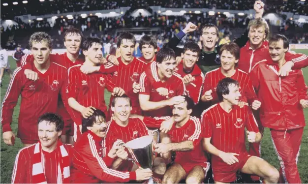  ??  ?? 0 Aberdeen’s Gothenburg heroes with Neale Cooper far left in the back row, next to now Scotland manager Alex Mcleish, who spoke about losing his friend yesterday.