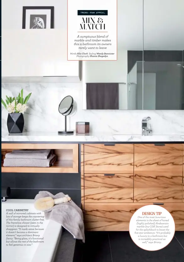  ??  ?? COOL CABINETRY
A wall of mirrored cabinets with lots of storage keeps the countertop of this family bathroom clutter-free. The frameless shower (seen in the mirror) is designed to virtually disappear. “It made sense because it doesn’t become a...