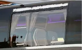  ??  ?? Smashed: the damaged window panel of Real Madrid’s bus
PA