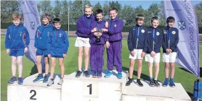  ??  ?? On top form Gerard Black, Dylan Edwards and Ruairidh Neil on the podium after claiming gold in Grangemout­h