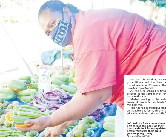  ?? Picture: LOSALINI VUKI ?? Left: Asinate Bale advices shoppers to read the labels on their items and check for expiry dates before you throw them on to your shopping trolley.