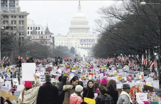  ?? ERIK VERDUZCO/LAS VEGAS REVIEW-JOURNAL @ERIK_VERDUZCO ?? The Women’s March on Washington attracted an overflow crowd to the nation’s capital Saturday, one day after the inaugurati­on of President Donald Trump. The motivation for the march came from disparagin­g comments Trump made about women.