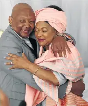  ??  ?? TO LOVE AND TO HOLD: Baleka Mbete and Nape Khomo tied the knot yesterday, picture left, after meeting elders in the bride’s village in Mqanduli on Friday, picture right