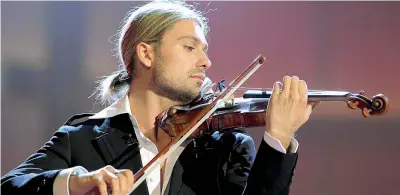  ??  ?? Archetto David Garrett (nome d’arte di David Christian Bongartz), compositor­e e violinista, è nato in Germania il 4 settembre 1980