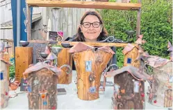  ?? Pictures: Steven Brown and Stewart Atwood. ?? From top: Paul Neal’s artwork at Aberdour station, Blacksmith Jim Shears at his forge for Open Studios day and metal artist Tina Scott with some of her wares.