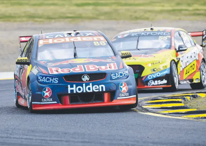  ?? Picture: AAP ?? Jamie Whincup (left) of Red Bull Holden Racing Team in action during the SuperSprin­t at Sydney Motorsport Park yesterday.