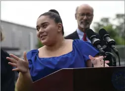  ?? BILL UHRICH — MEDIANEWS GROUP ?? Isabella Torres speaks about the difficulty in acquiring infant formula for her 3-month-old son, Mateo Torres Viera, during Gov. Tom Wolf’s visit to ByHeart on Wednesday.