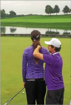  ?? L.A. PARKER — TRENTONIAN PHOTO ?? Australian osteopathi­c Dr. Adam Olarenshaw, right, delivers hands on treatment to LPGA star Sandra Gal and other players.