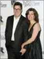  ?? EVAN AGOSTINI — THE ASSOCIATED PRESS FILE ?? In this file photo, musician Vince Gill and wife, singer Amy Grant, attend the Revlon Concert for the Rainforest Fund dinner and auction at The Pierre Hotel in New York.