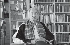  ?? LM OTERO/AP PHOTO, FILE ?? In this April 30, 2014, file photo, Pulitzer Prize-winning author Larry McMurtry poses at his book store in Archer City, Texas. McMurtry has died at the age of 84. His death was confirmed Friday by a spokesman for his publisher Liveright. Several of McMurtry’s books became feature films, including the Oscar-winning films “The Last Picture Show” and “Terms of Endearment.” He also co-wrote the Oscar-winning screenplay for “Brokeback Mountain.”