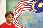  ?? ?? Rull with his magnificen­t artwork of Jalur Gemilang – PICS BY SYAZWAN KAMAL