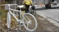  ?? HAMILTON SPECTATOR FILE PHOTO ?? A ghost bicycle was placed on the Claremont Access to memorializ­e cyclist Jay Keddy, who was killed there in December 2015.