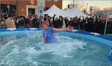  ?? PHOTO COURTESY OF ALBERT CARTER ?? Royal Oak resident and police Lt. Albert Carter took the Polar Plunge during the 2022Winter Blast festival as part of the Royal Oak Police Department’s effort to raise more than $7,500for Special Olympics Michigan.