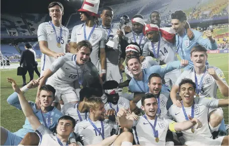  ??  ?? England Under-20s celebrate winning the Under-20 World Cup with yesterday’s final win over Venezuela in South Korea.